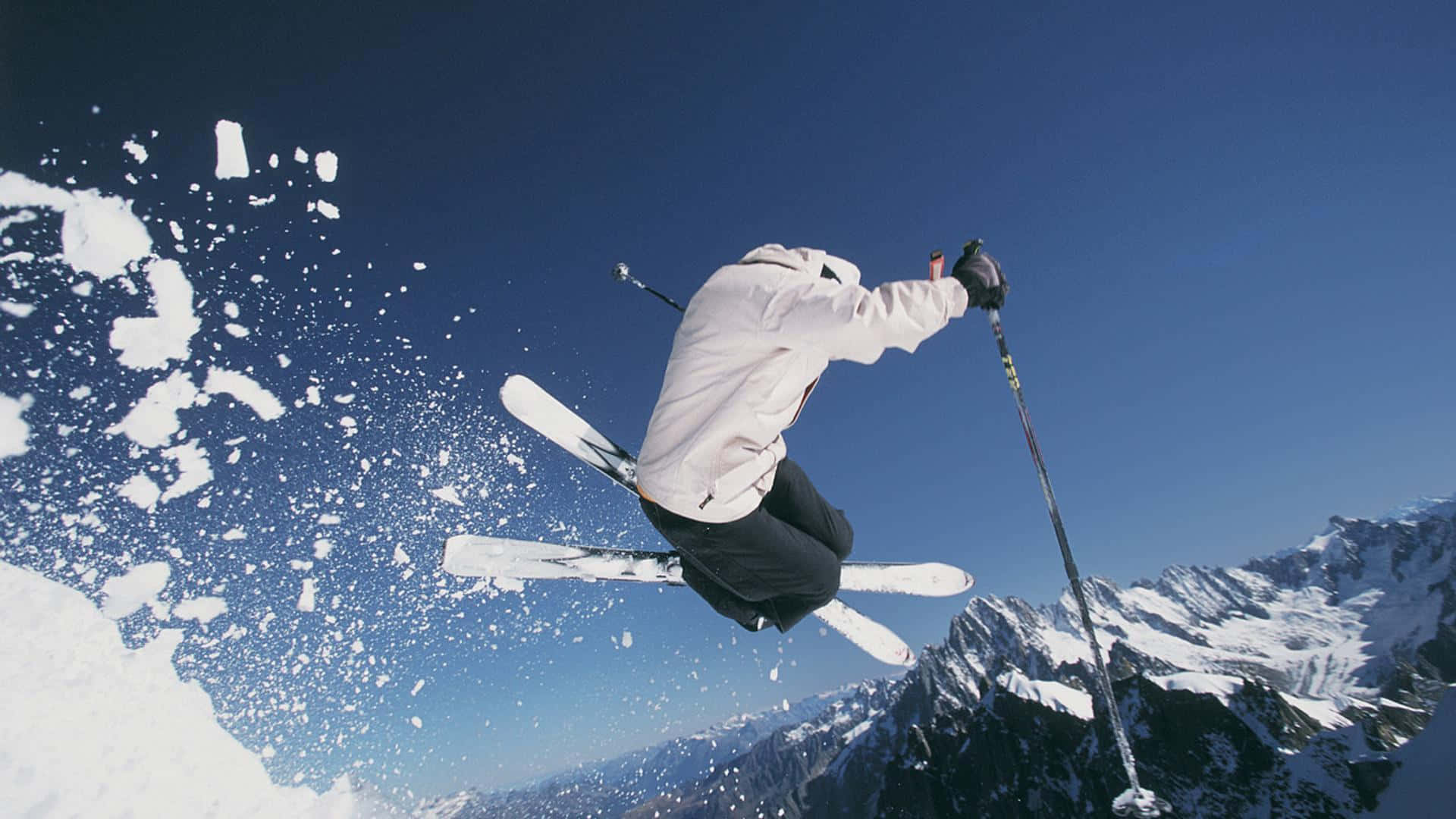 Gönnensie Sich Eine Pause Von Den Belastungen Des Alltags Und Genießen Sie Einen Tag Auf Dem Ski-berg. Wallpaper