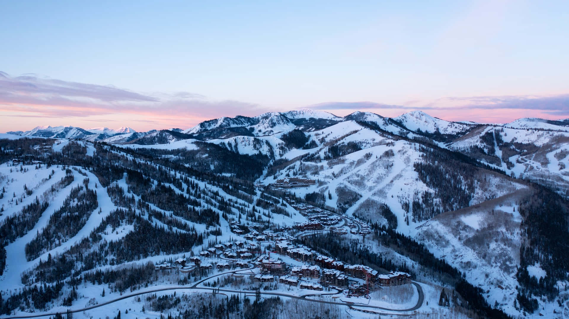 An aerial view of the snow-covered ski mountain Wallpaper