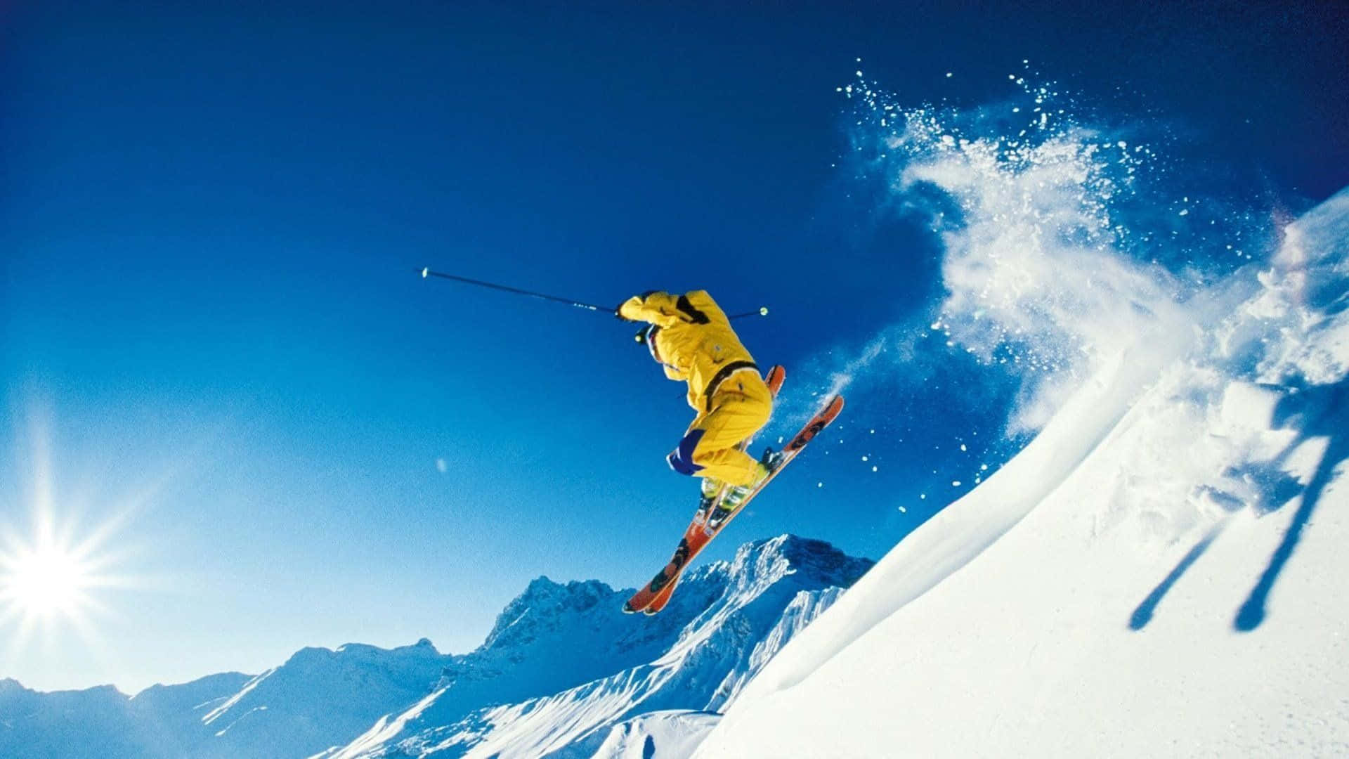 A stunning view of a ski mountain. Wallpaper