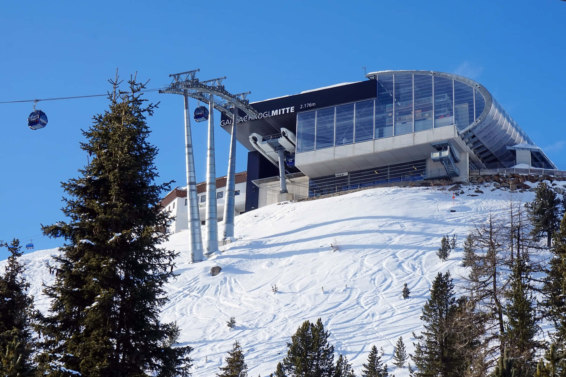 Breathtaking View of a Ski Resort in Winter Wallpaper