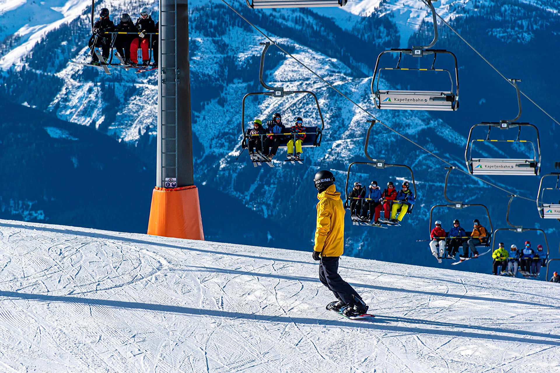Scenic Ski Resort in Winter Wonderland Wallpaper