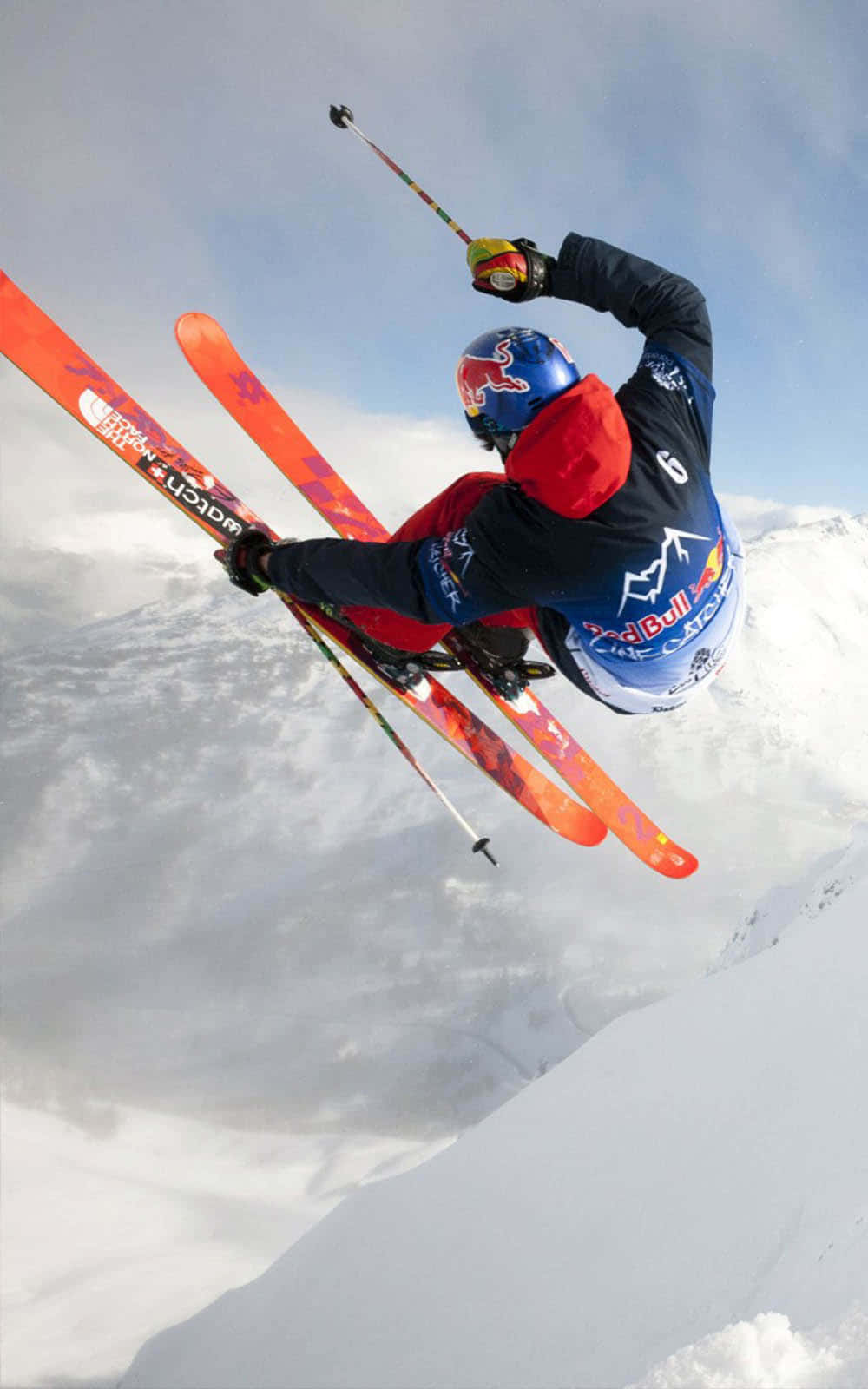 Captivating Skier Gliding Down a Snowy Mountain Slope