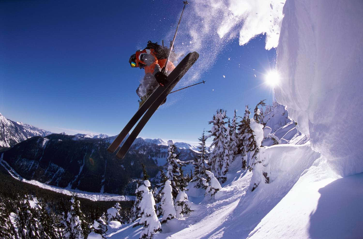Captivating Moment of a Skier in the Snowy Mountains