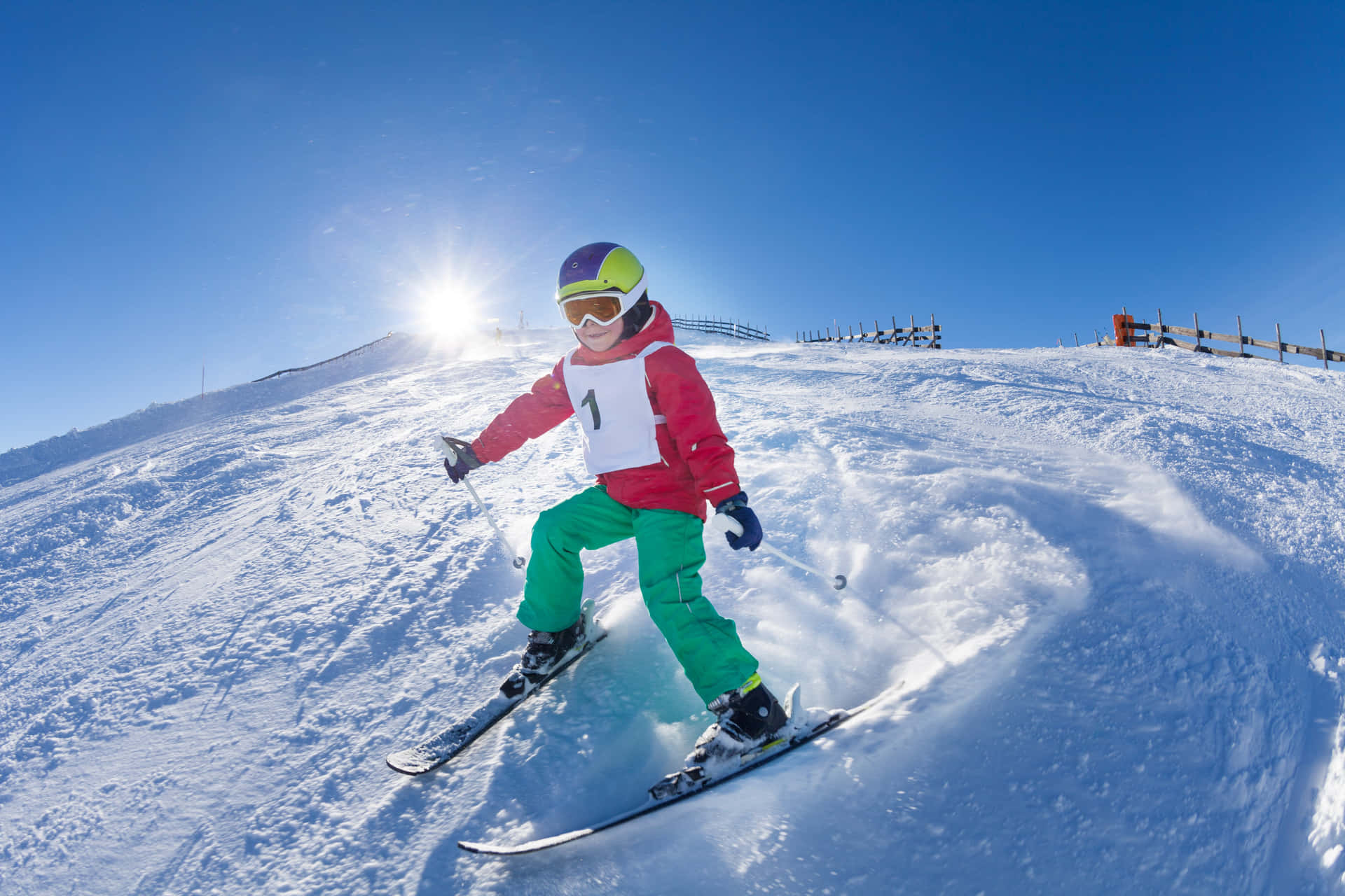 Experience the exhilaration of skiing in snow-covered alps Wallpaper