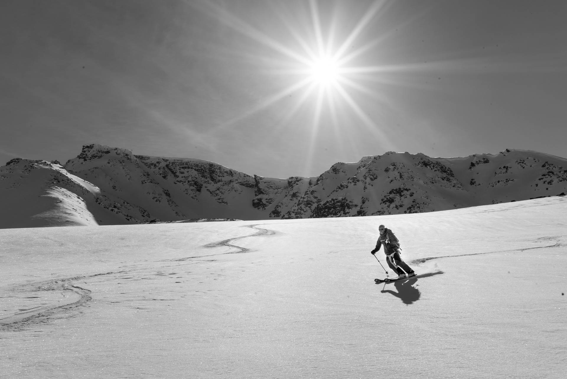 Skifahrenmit Sonne Wallpaper