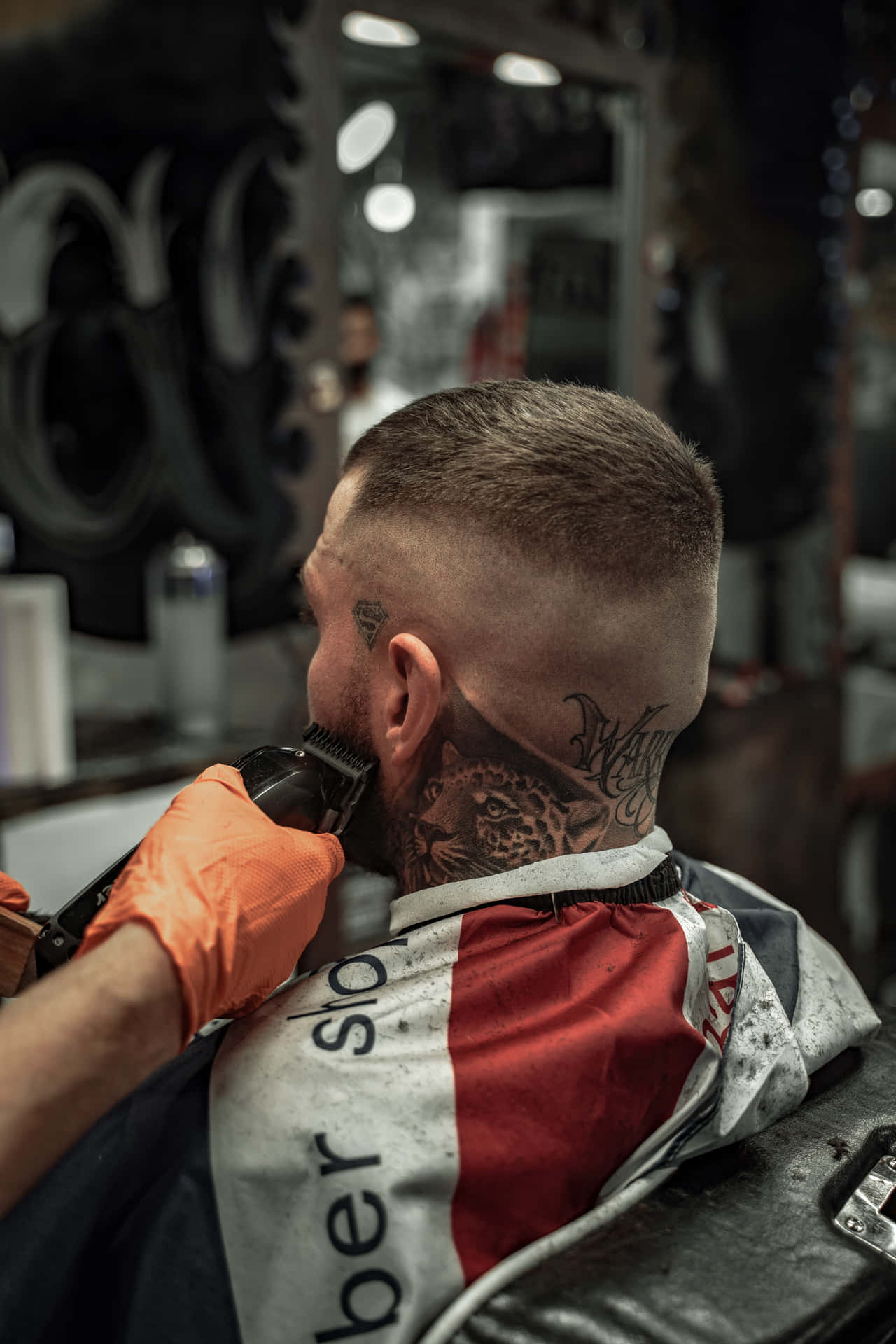 Skilled Barber Perfecting A Classic Haircut