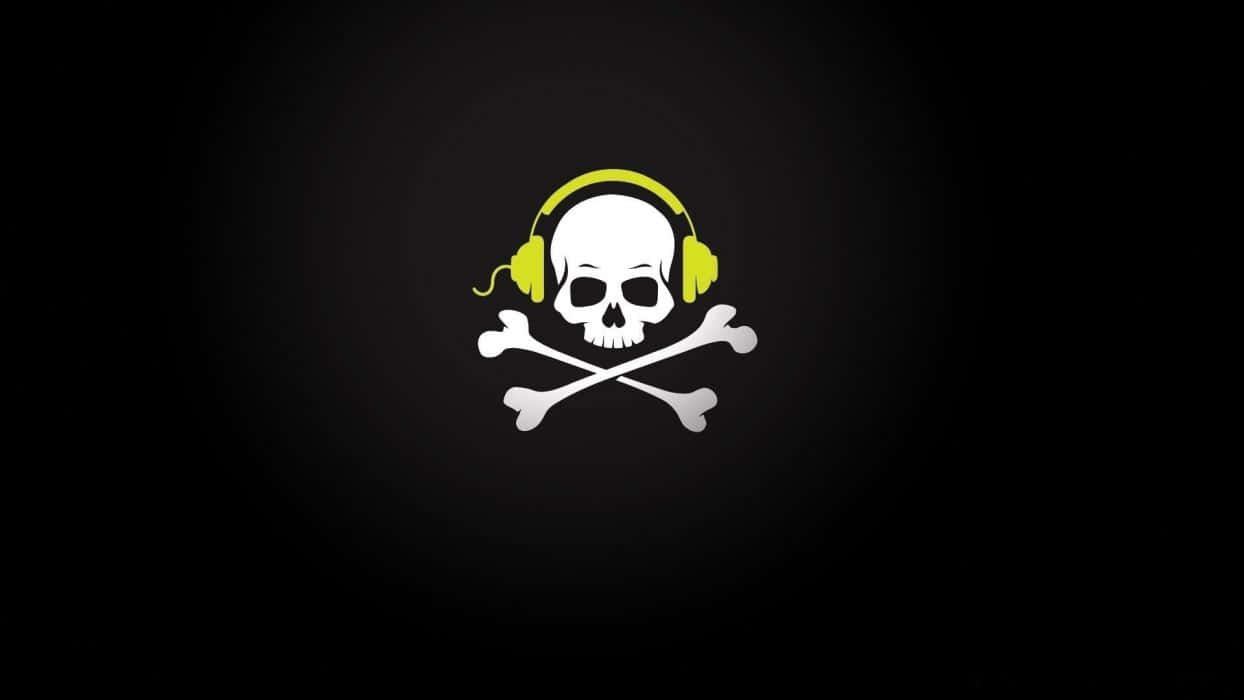 A Skull With Headphones On A Black Background Wallpaper