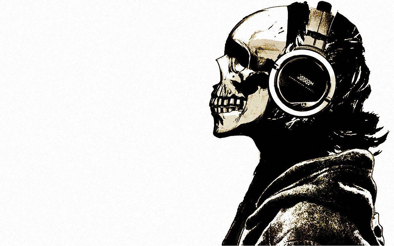 A skull adorned with headset, showing technology is here to stay Wallpaper