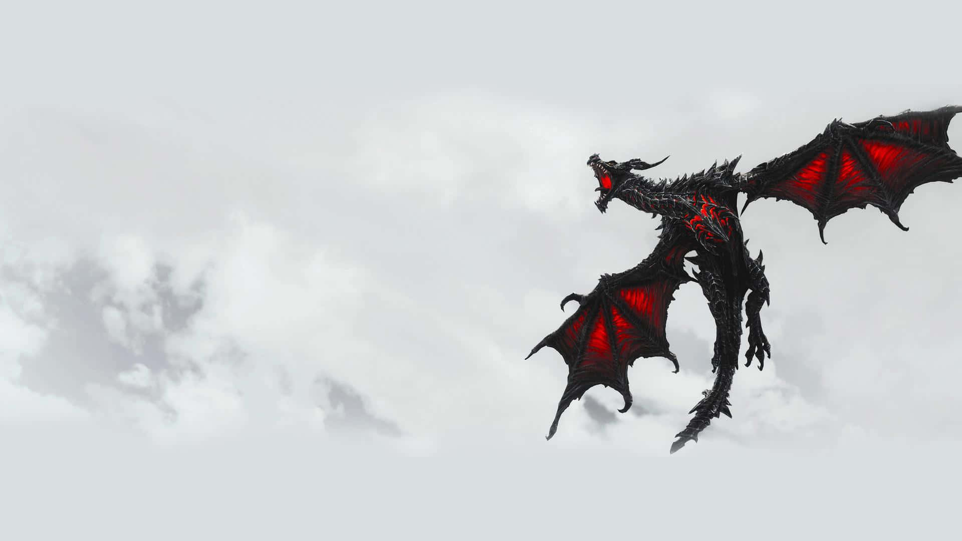 Alduin, the World Eater, menacingly soaring above the mountains of Skyrim Wallpaper