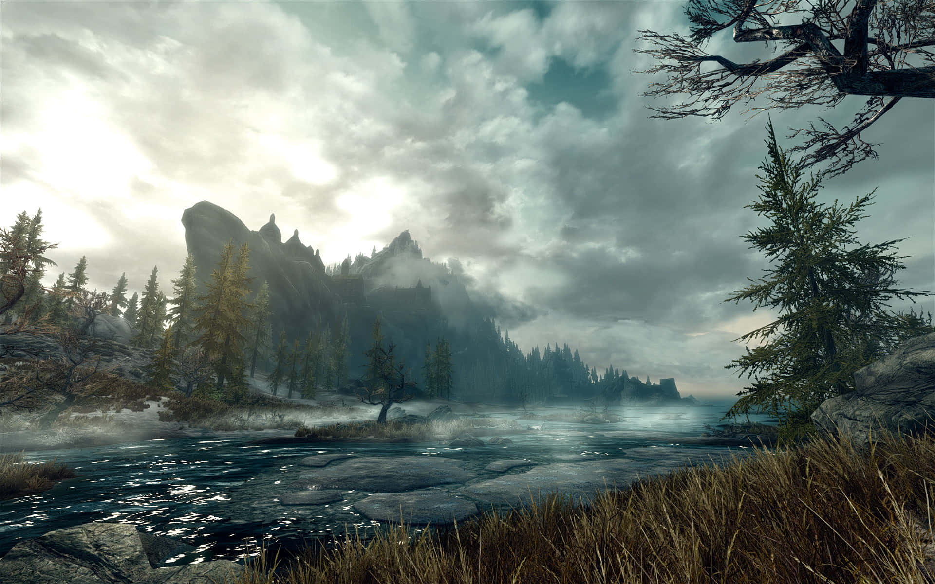 Majestic Skyrim Landscape with Mountainous Background Wallpaper