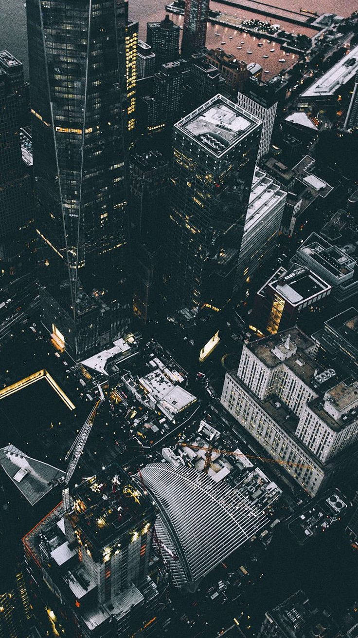 Aerial View Of A Skyscrapers In A Busy City Wallpaper