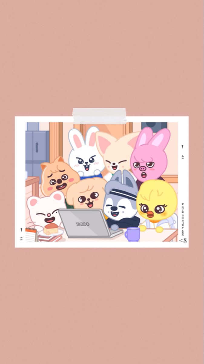 Skzoo Characters Gathered Around Laptop Wallpaper