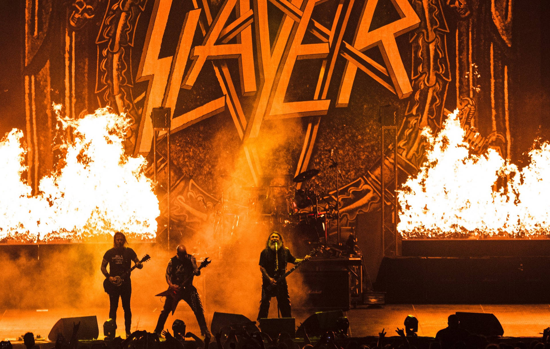 An electrifying performance by Slayer, a titan in the world of Thrash Metal. Wallpaper