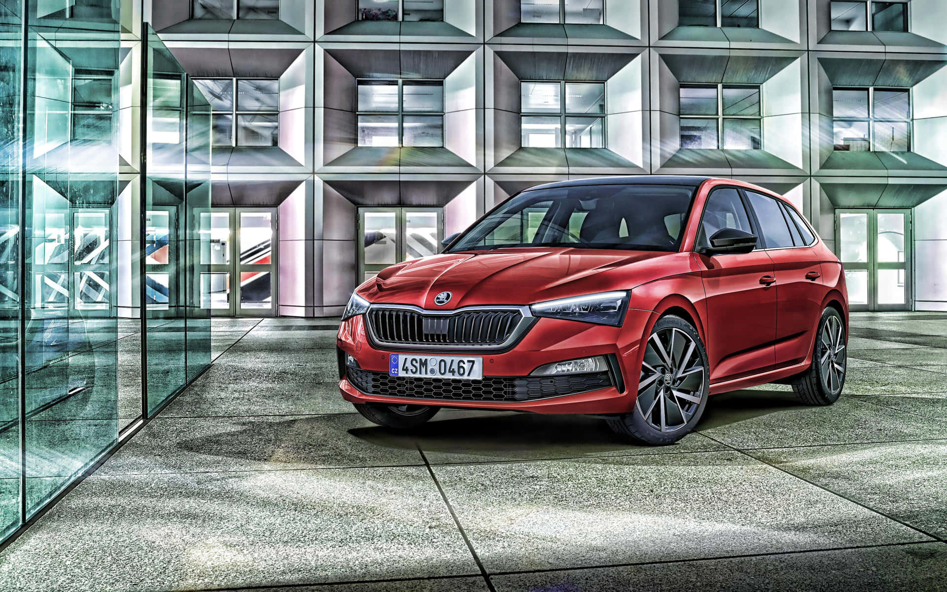 Sleek And Advanced Skoda Scala In A Modern Urban Setting Wallpaper