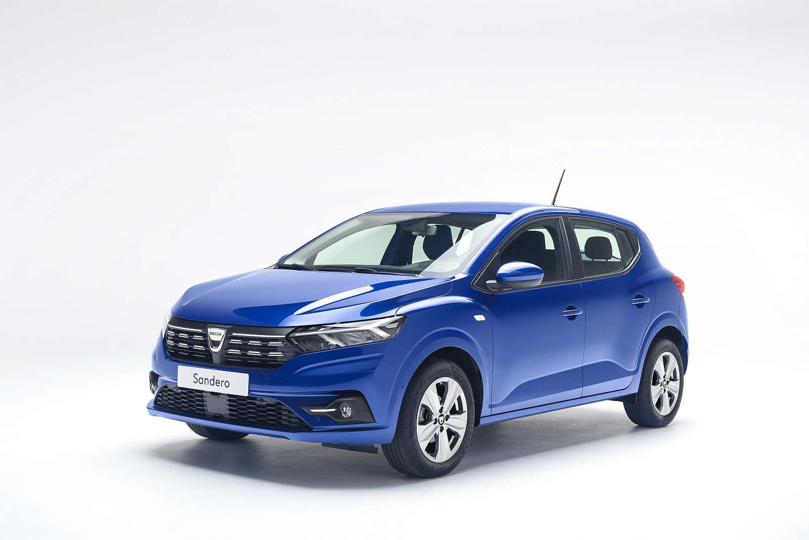 Sleek And Elegant Dacia Sandero On The Road Wallpaper