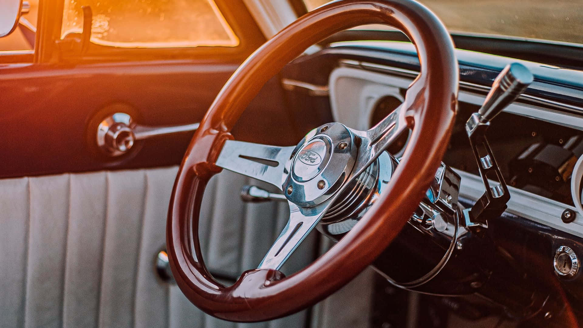 Sleek And Modern Car Steering Wheel Wallpaper