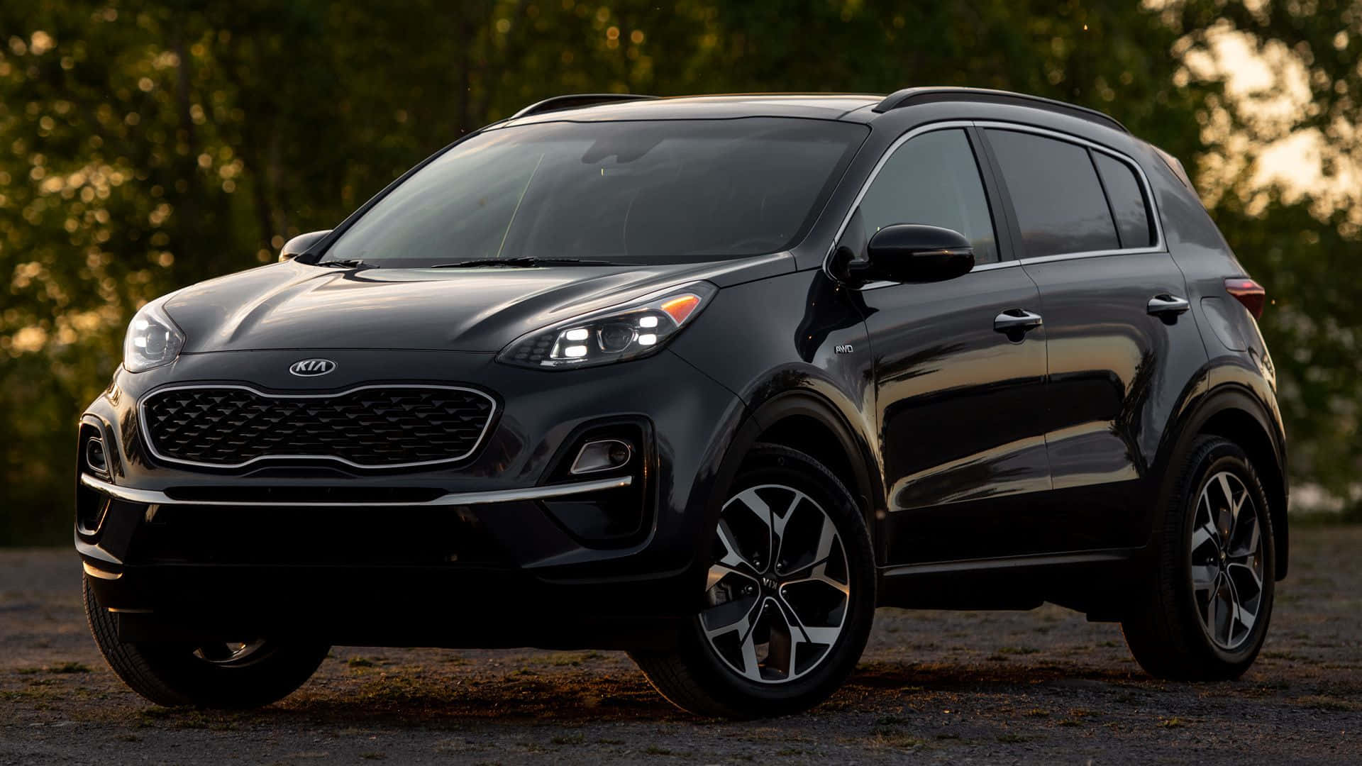 Sleek And Modern Kia Sportage On The Go Wallpaper