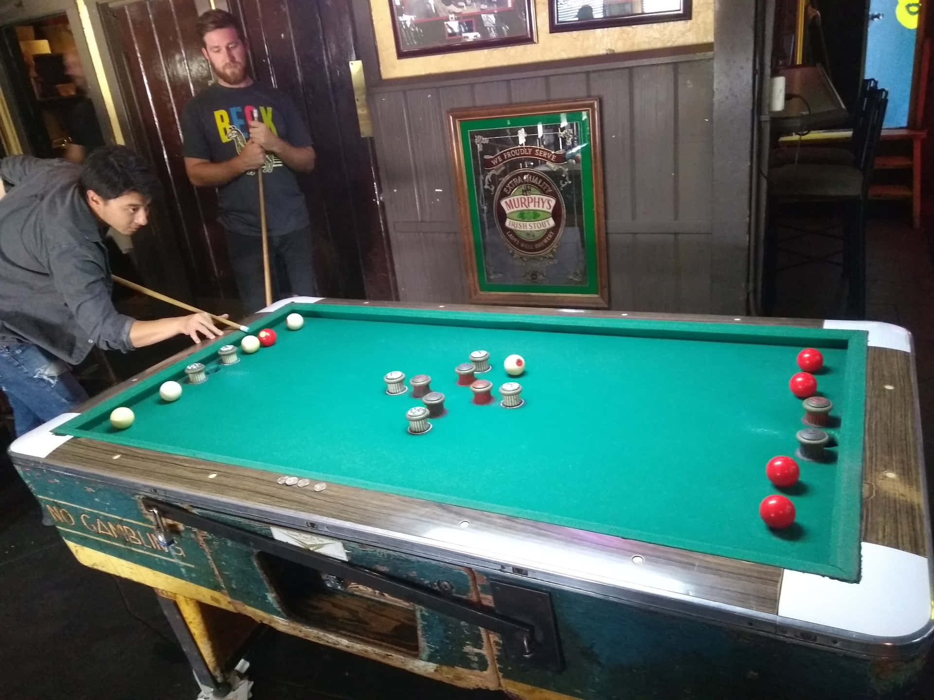 Sleek And Modern Pool Table In Ambient Lighting