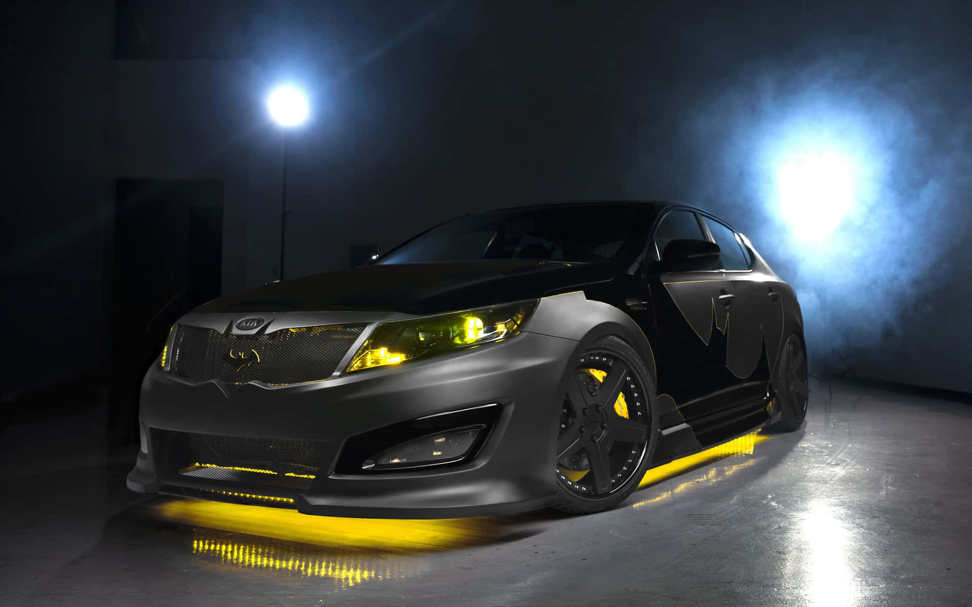 "sleek And Powerful Batman Car Roaming The Night" Wallpaper