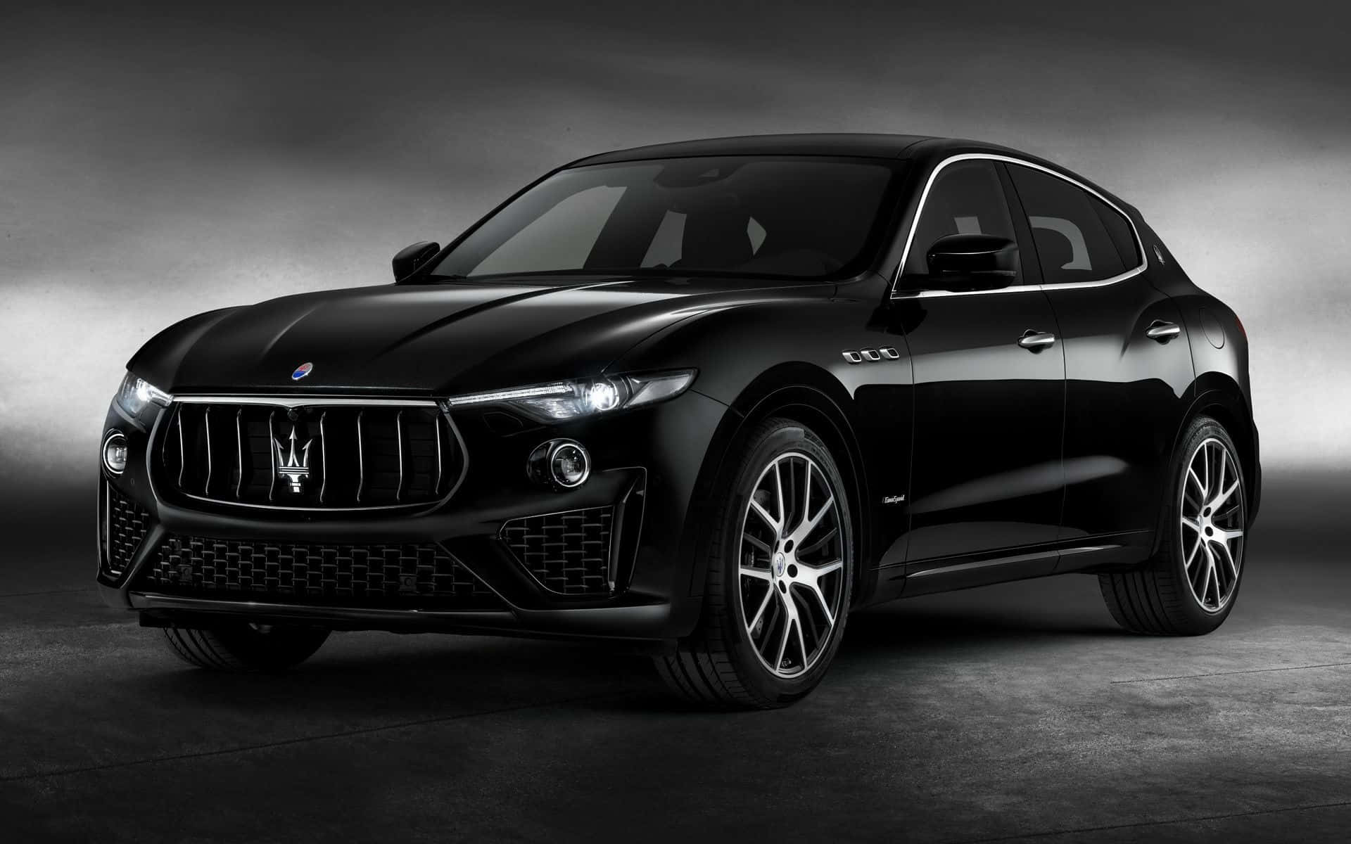 Sleek And Powerful Maserati Levante In Motion Wallpaper