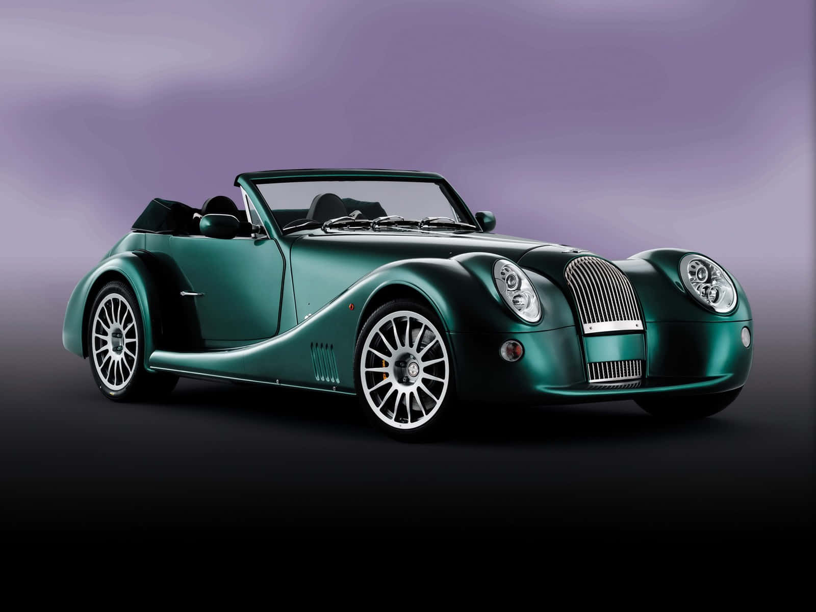 Sleek And Powerful Morgan Aero 8 On A Scenic Country Road Wallpaper