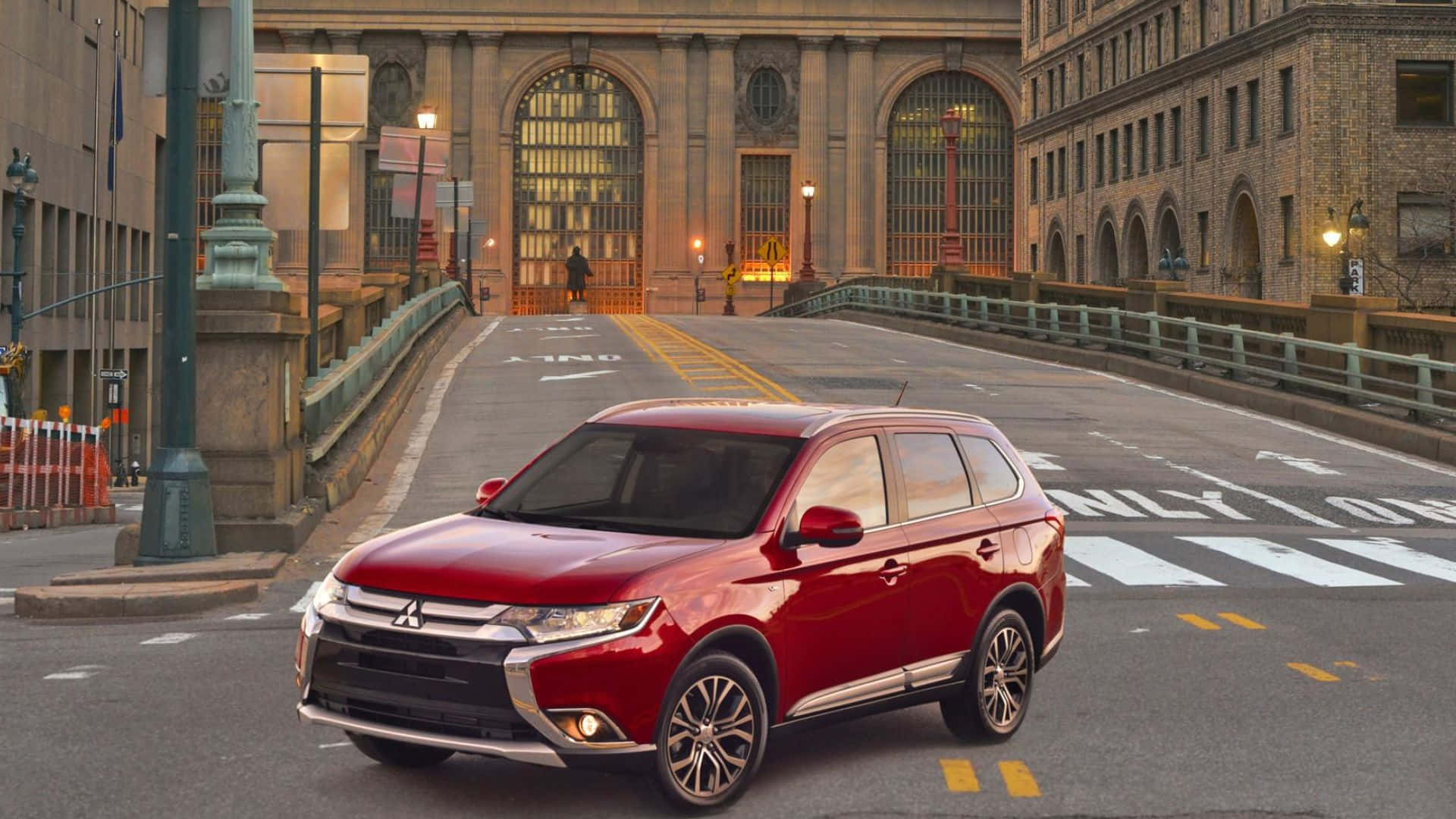 Sleek And Sophisticated Mitsubishi Outlander In Nature Wallpaper