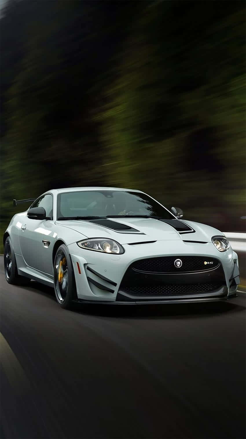 Sleek And Stunning Jaguar Xkr In Action Wallpaper