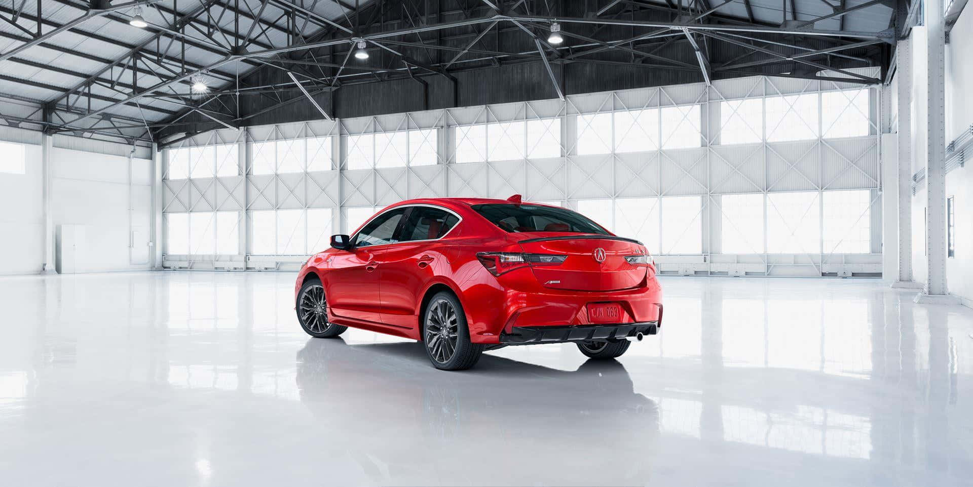 Sleek And Stylish Acura Ilx On The Move Wallpaper