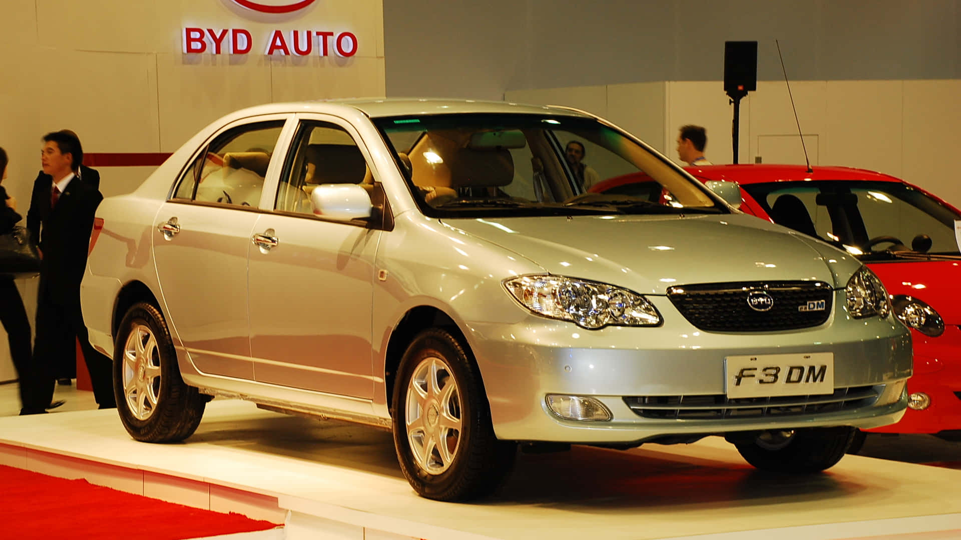 Sleek And Stylish Byd F3 On Road Wallpaper
