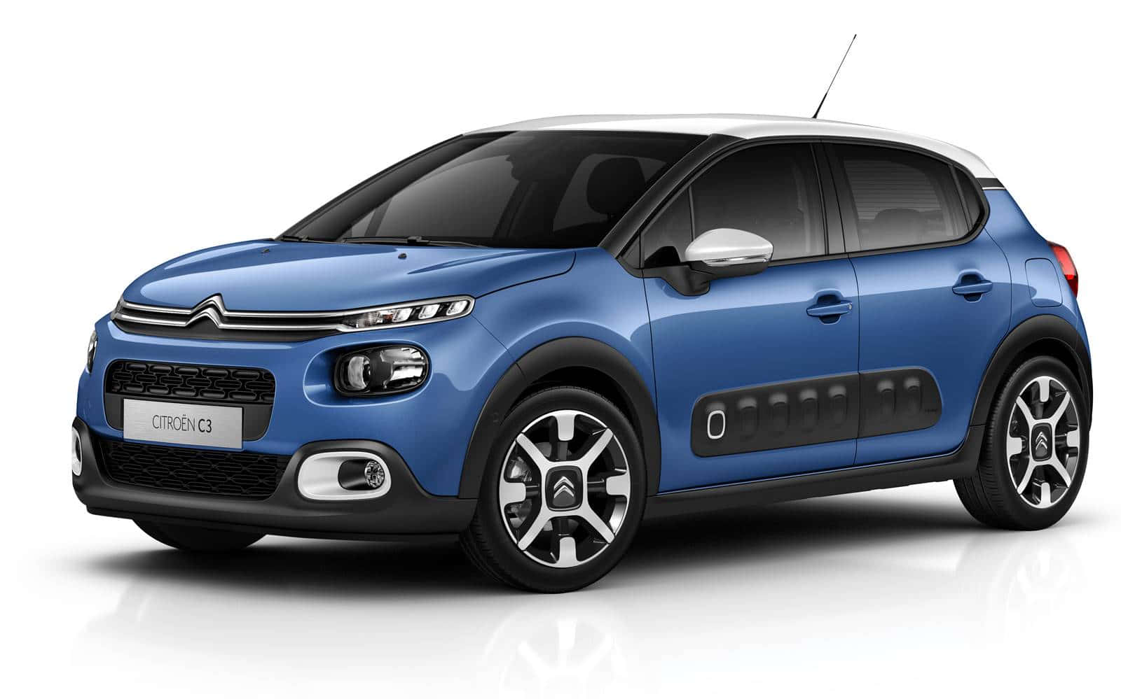 Sleek And Stylish Citroen C3 On Road Wallpaper