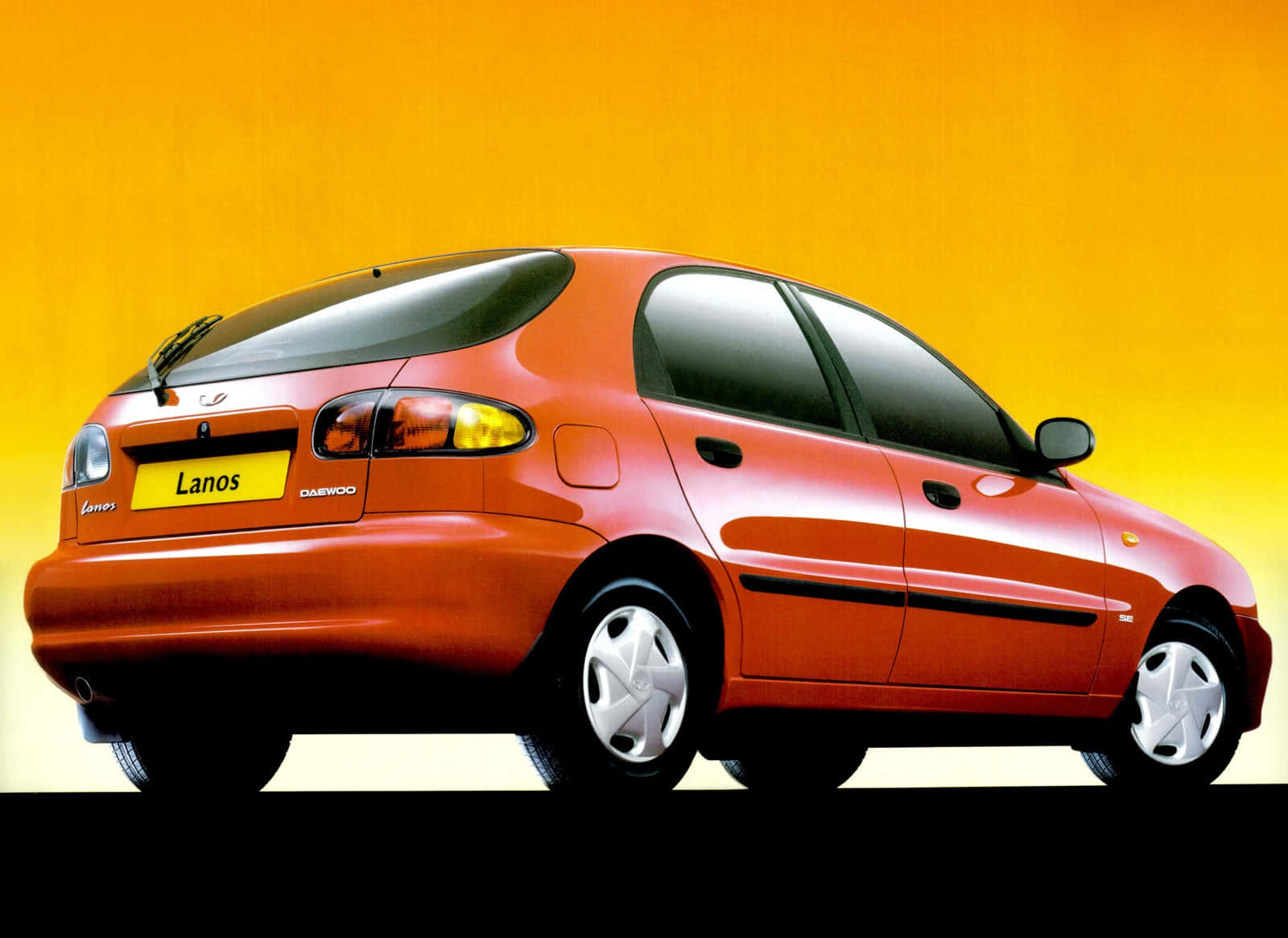 Sleek And Stylish Daewoo Lanos In Vibrant Red Wallpaper