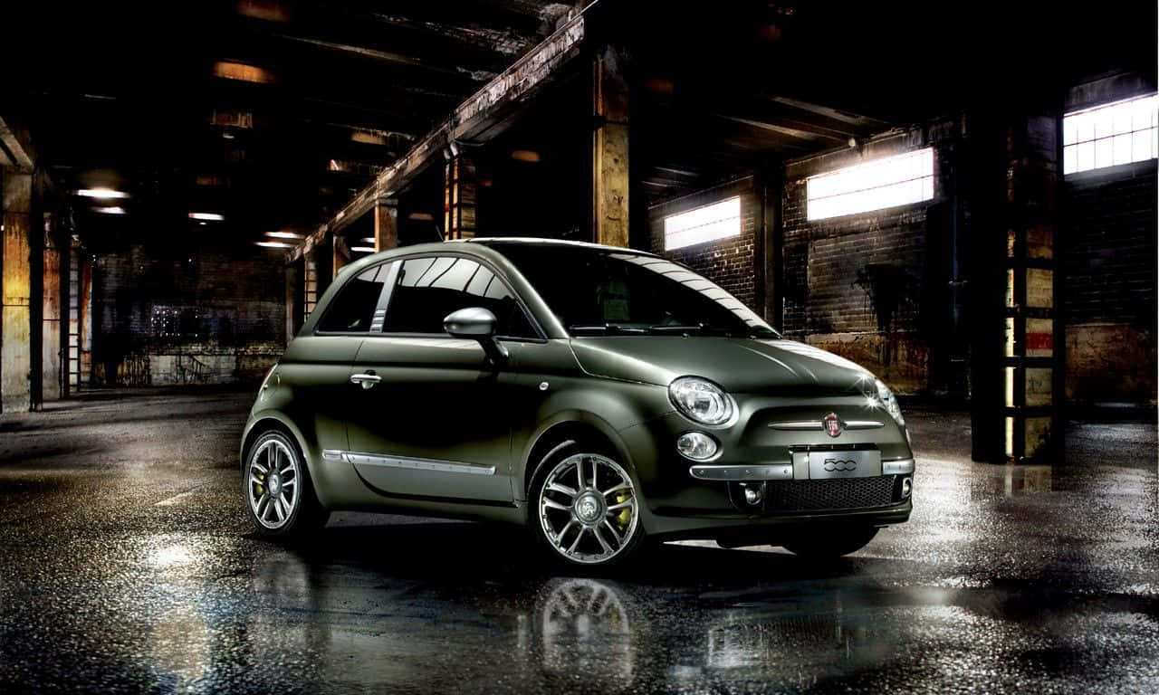 Sleek And Stylish Fiat 500x On The Road Wallpaper