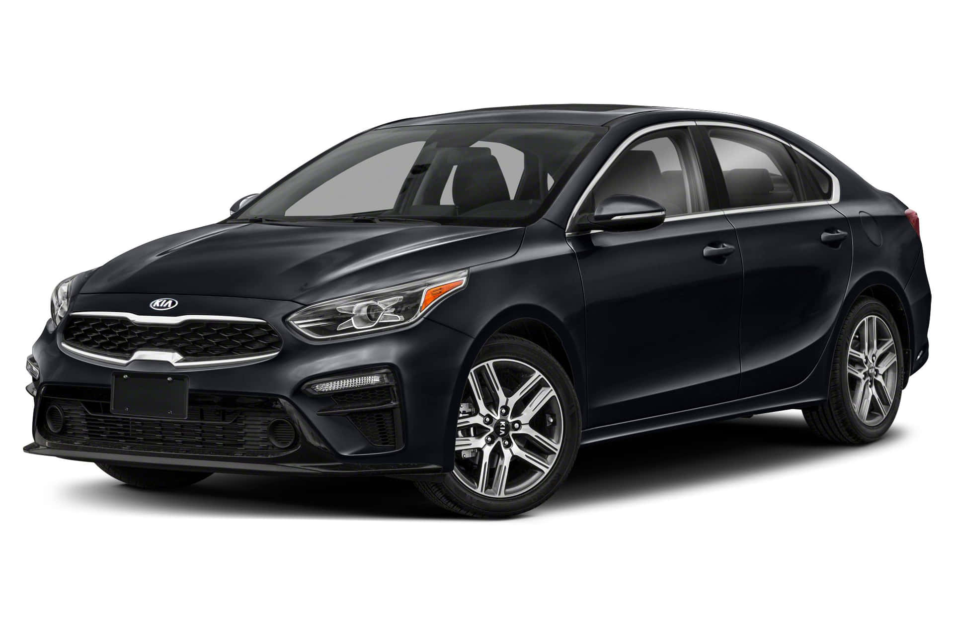 Sleek And Stylish Kia Forte On The Open Road Wallpaper