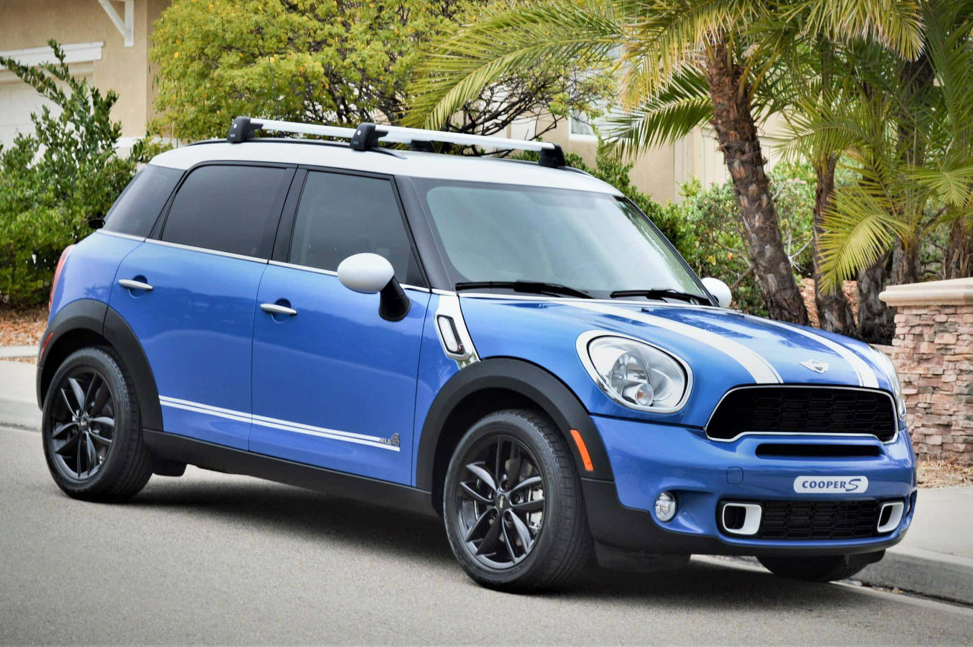 Sleek And Stylish Mini Cooper Countryman In Action Wallpaper