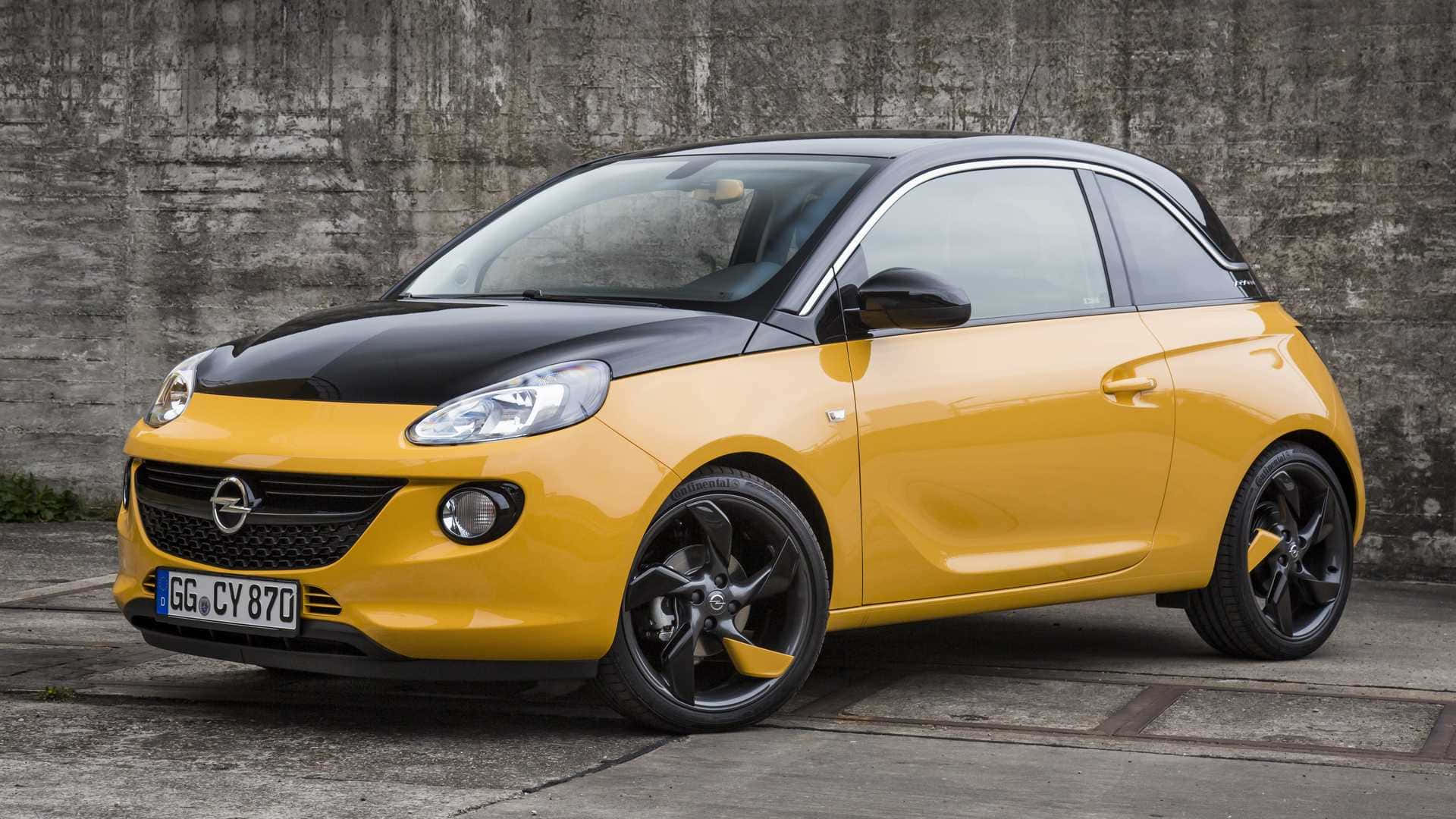 Sleek And Stylish Opel Adam In Urban Environment Wallpaper