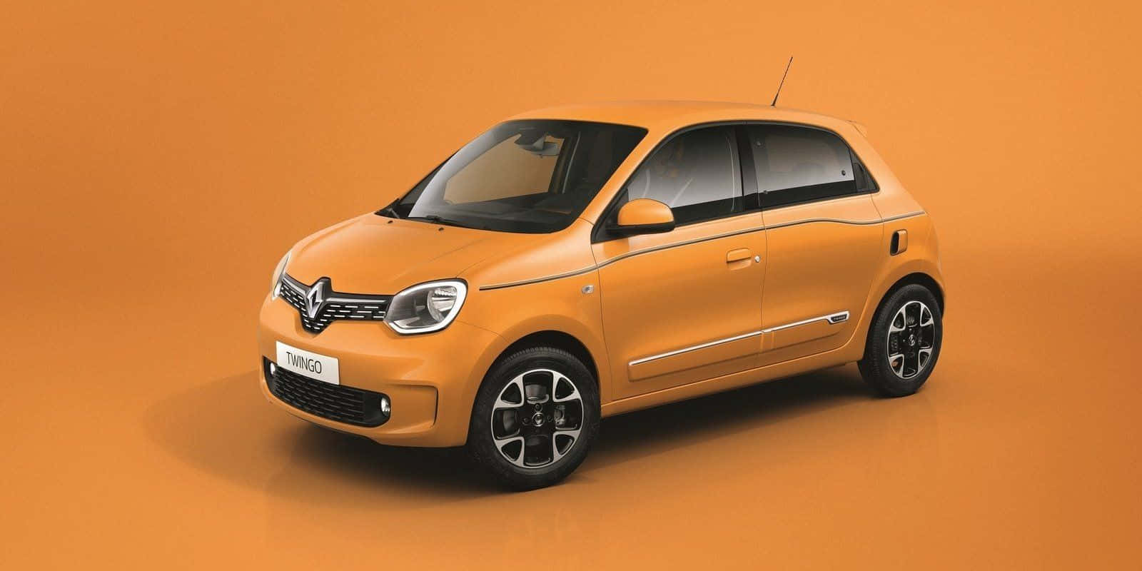 Sleek And Stylish Renault Twingo In Urban Scenery Wallpaper