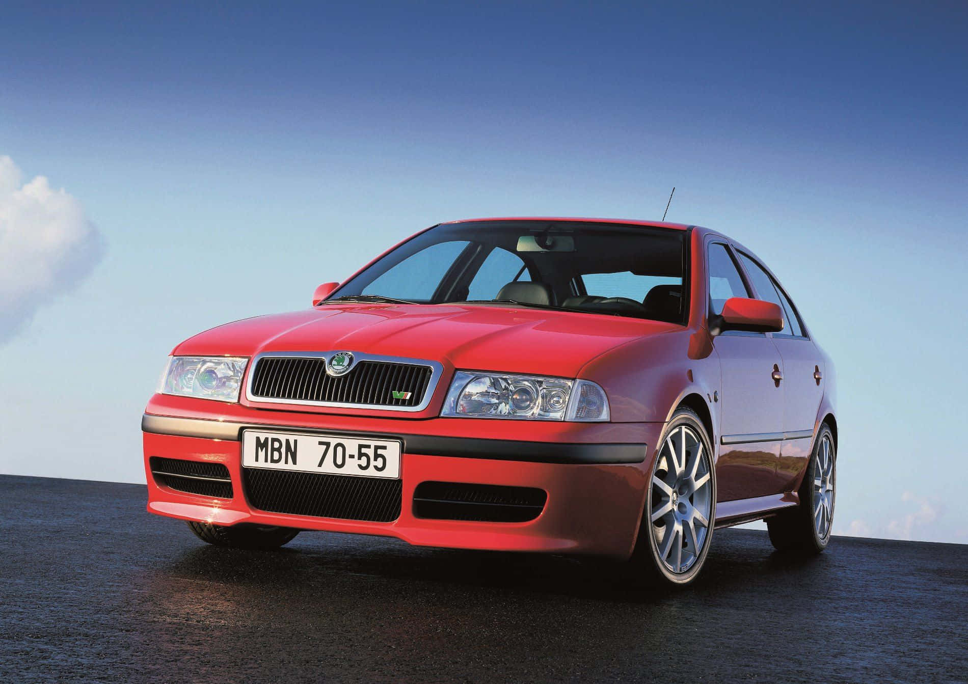 Sleek And Stylish Skoda Octavia In The Open Road Wallpaper