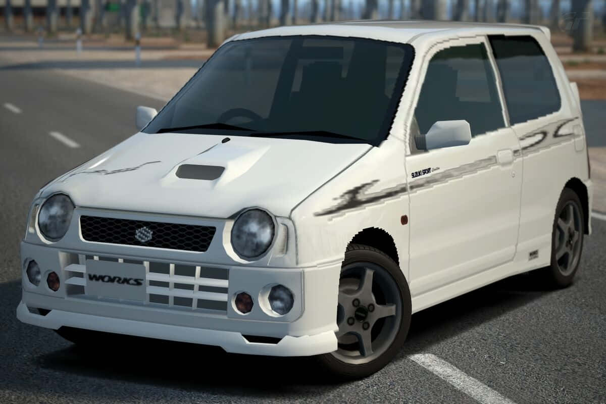 Sleek And Stylish Suzuki Alto Against A Backdrop Of Clouds Wallpaper