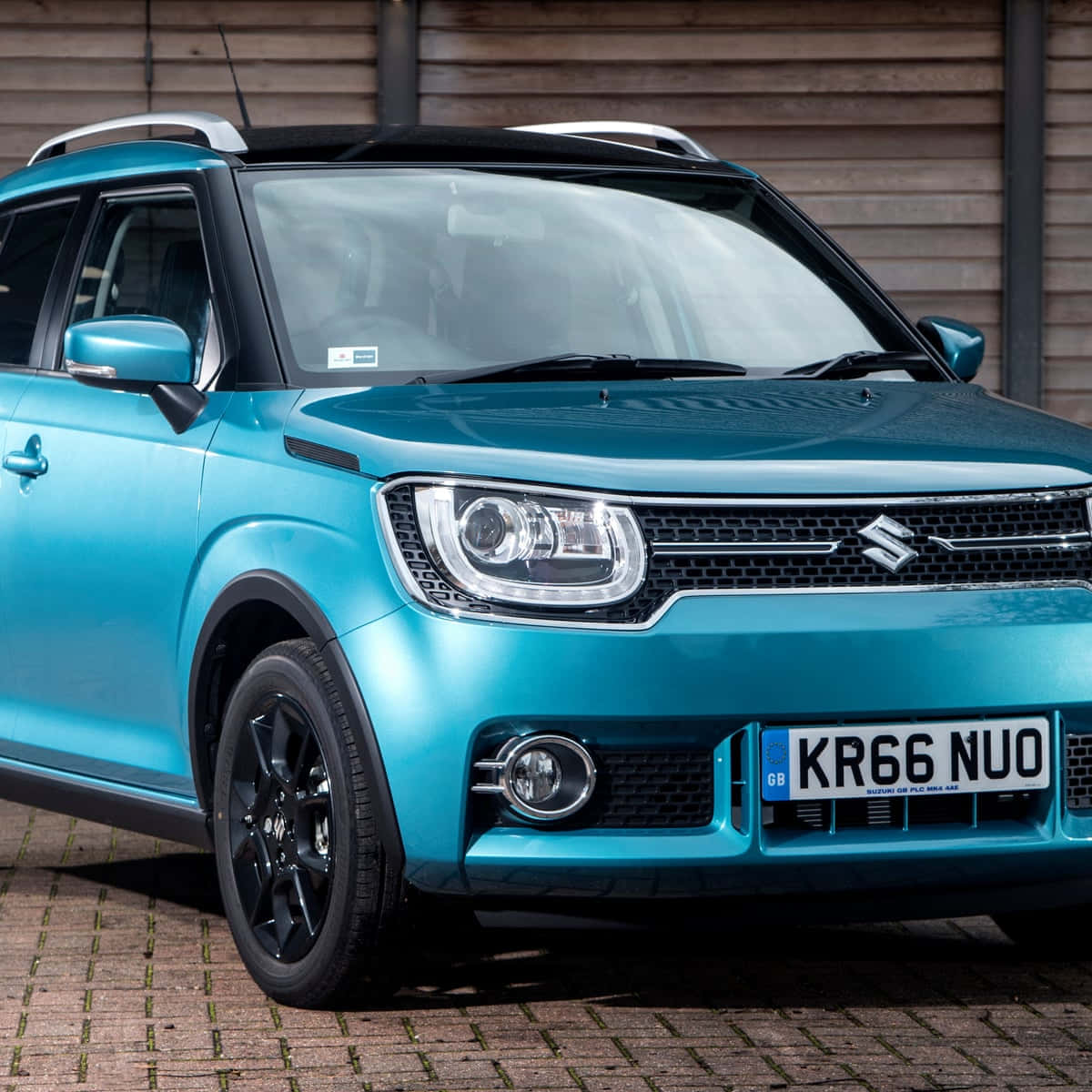 "sleek And Stylish Suzuki Ignis On The Open Road" Wallpaper