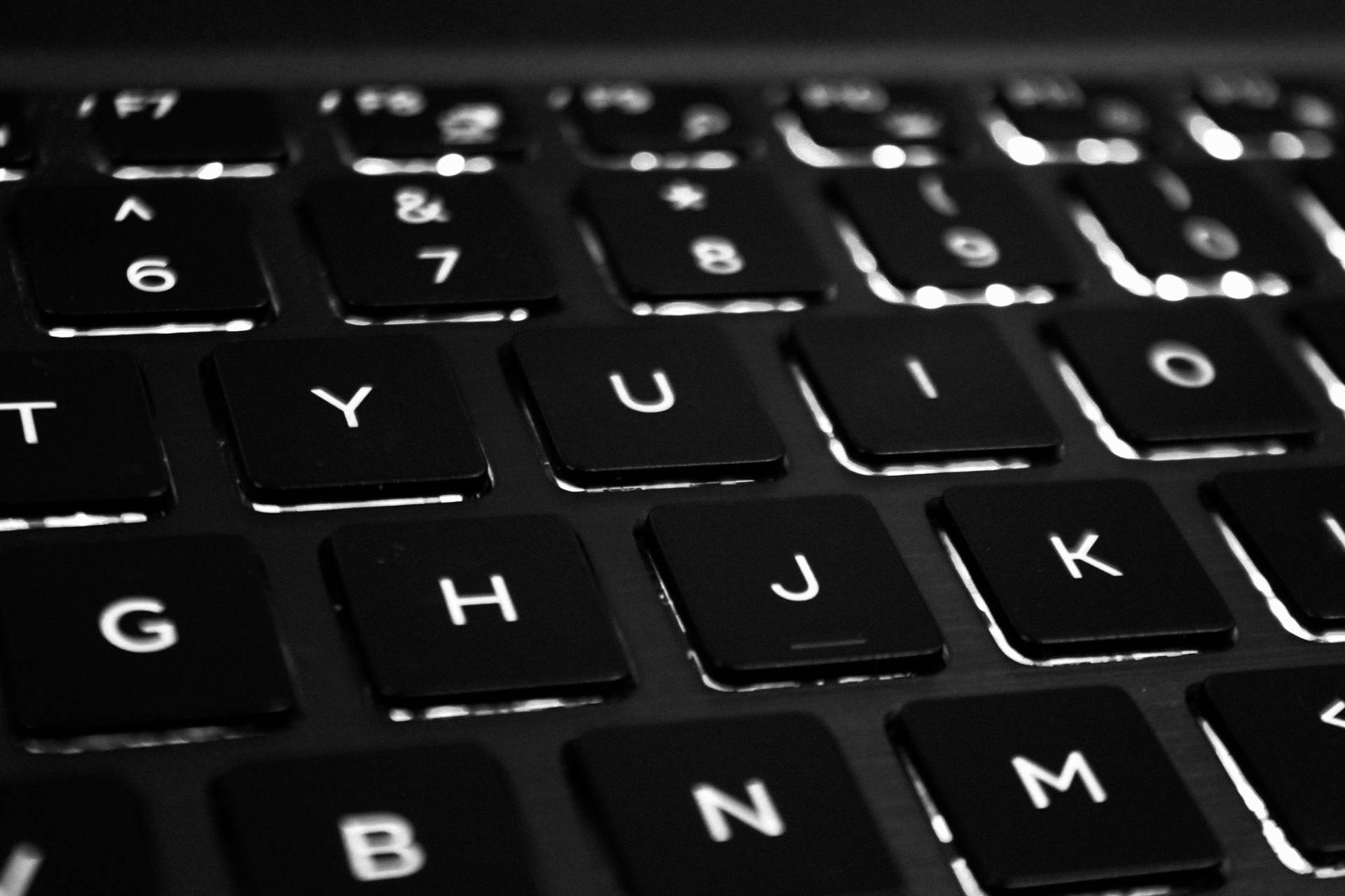Sleek Black Matte Computer Keyboard Background