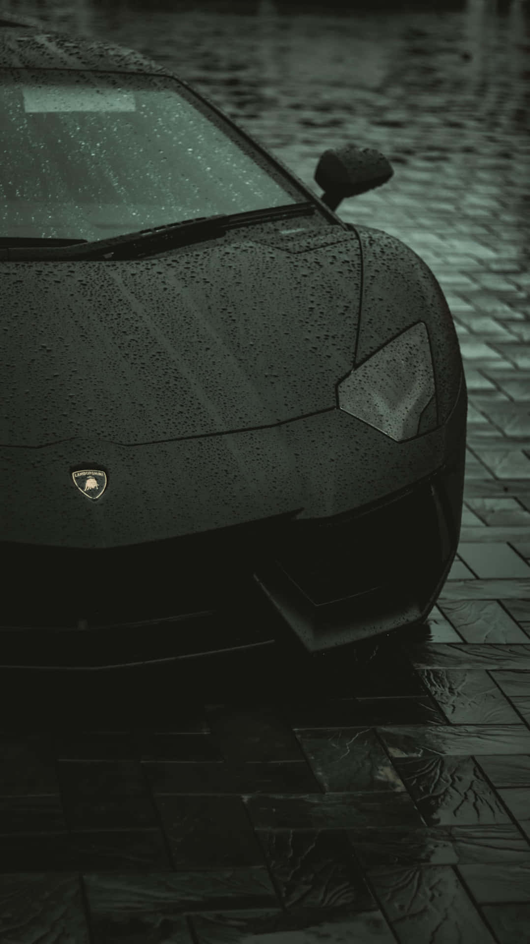 Sleek Black Sports Car Rainy Day Wallpaper