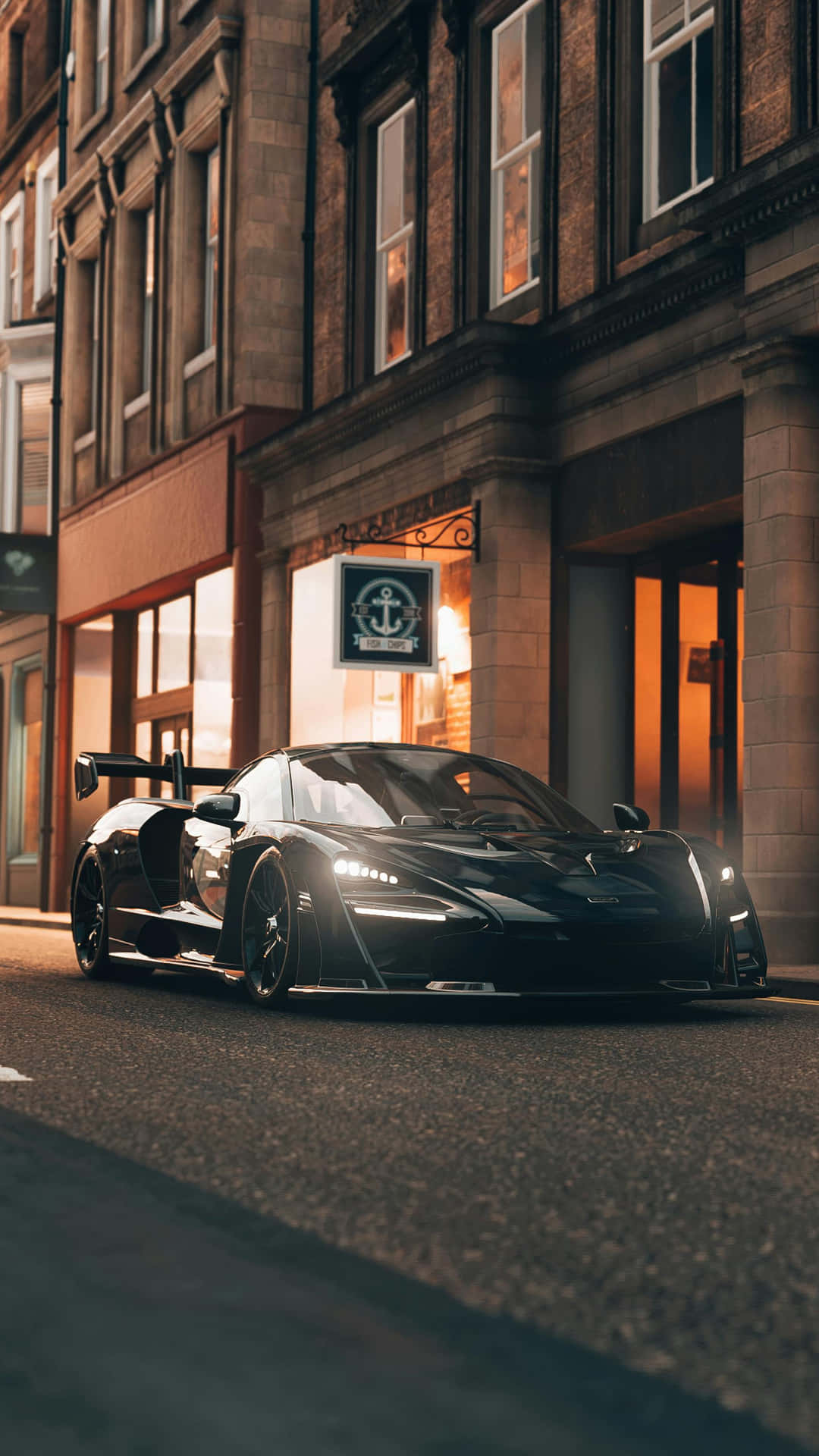 Sleek_ Black_ Supercar_ Evening_ Cityscape.jpg Wallpaper