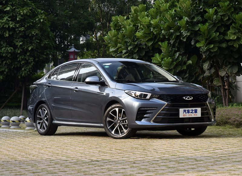 Sleek Chery Arrizo 5 Posed Against A Scenic Backdrop Wallpaper