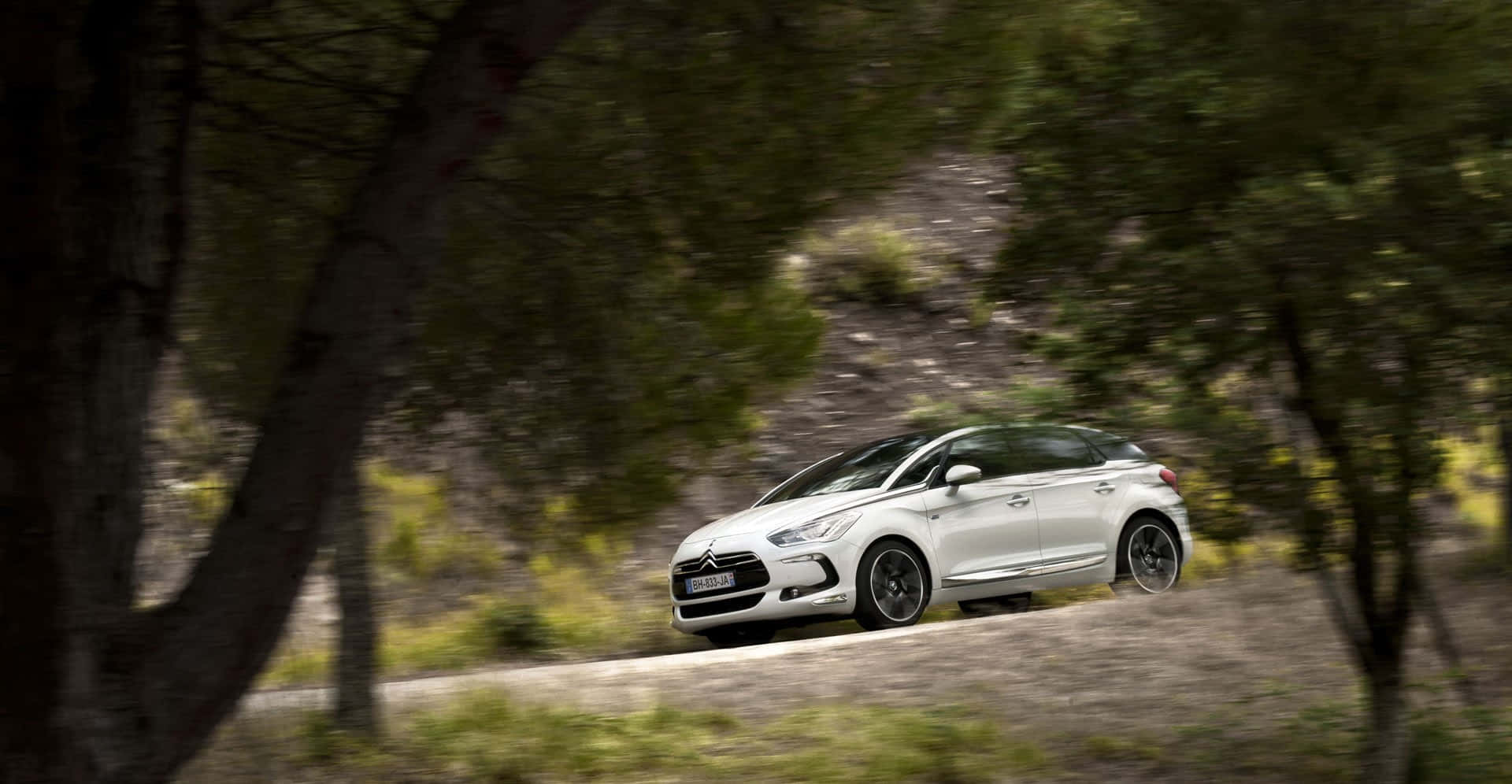 Sleek Citroen Ds5 On A Breathtaking Journey Wallpaper