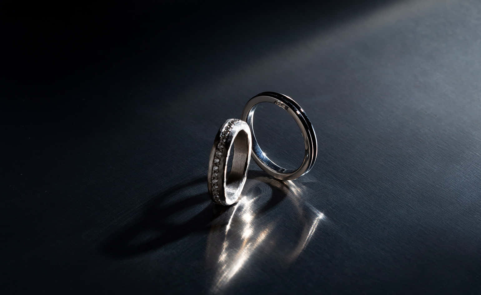 Download Sleek Design Silver Engagement Rings Wallpaper 
