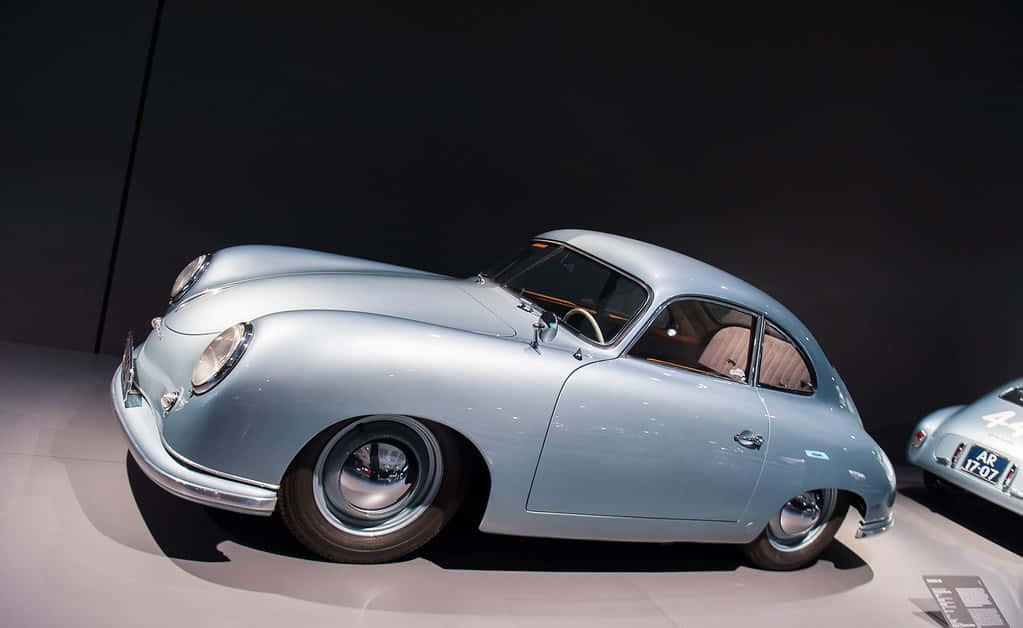 Sleek Elegance In A Vintage Porsche 356 Wallpaper