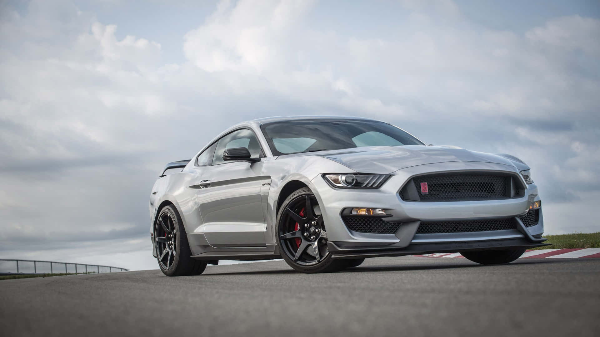Sleek Ford Mustang Gt350r Making Waves On The Race Tracks Wallpaper