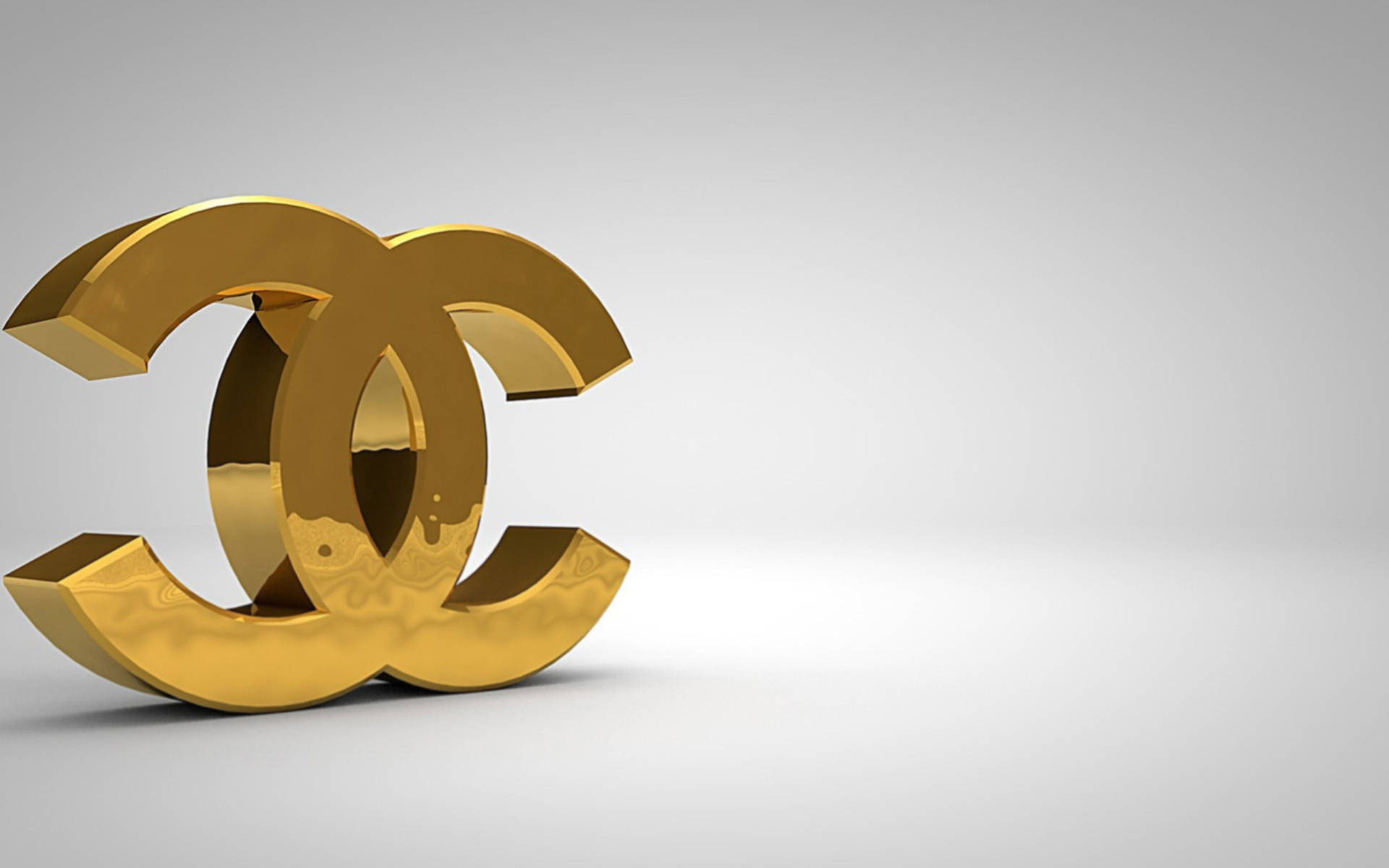 Sleek Gold Chanel Logo Wallpaper