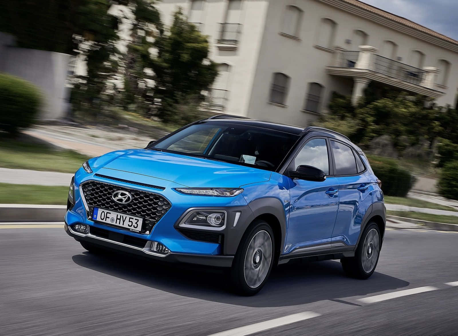 Sleek Hyundai Kona Suv In Vibrant Green Wallpaper