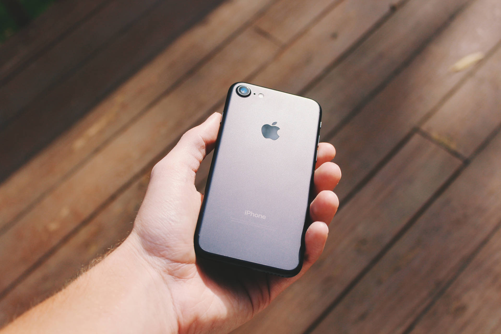 Sleek Iphone 8 With Stunning Background Wallpaper